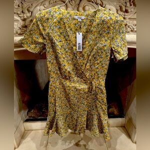 Lovely dress, brand new with tags.  See photos for details.